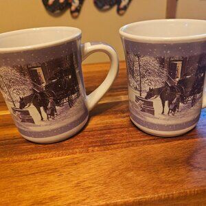Douglas Laird mugs snow scenes with horses and dog